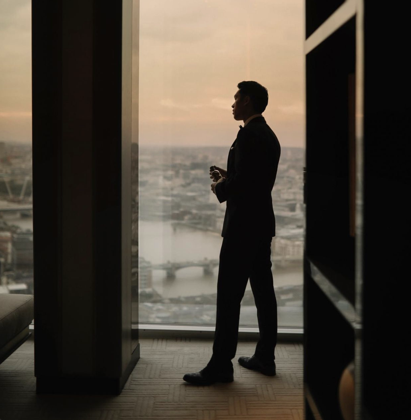 Hugo Boss perfume campaign with Q Mike influencer luxury fragrance lifestyle London skyline